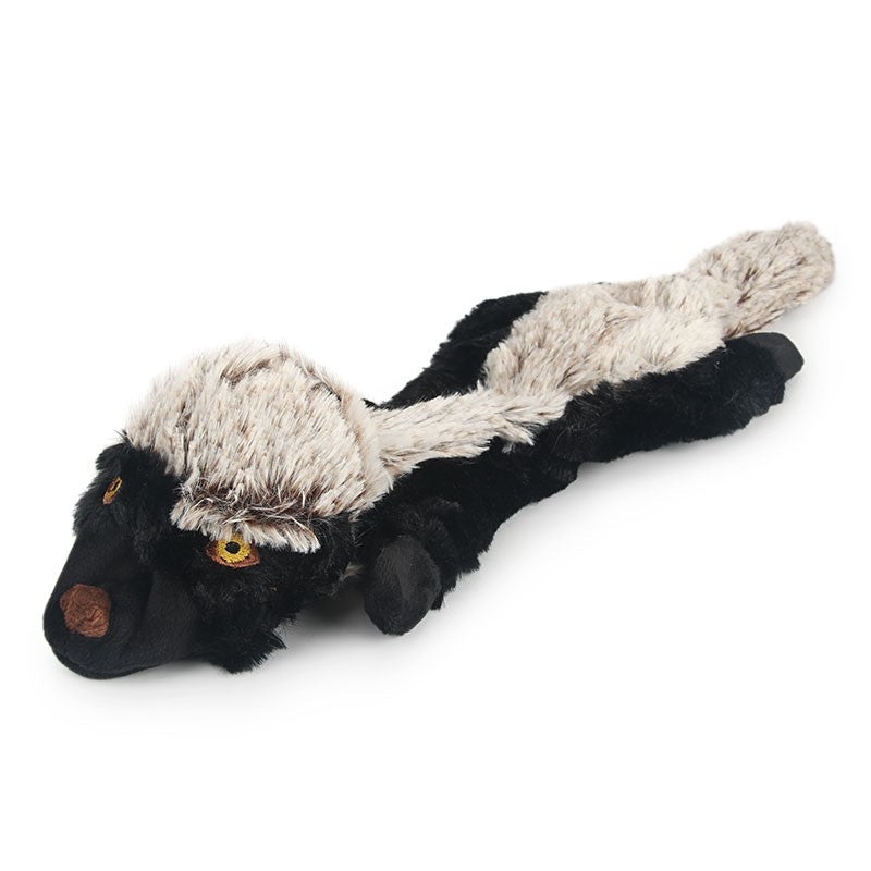 Honey badger dog toy with a long fluffy tail