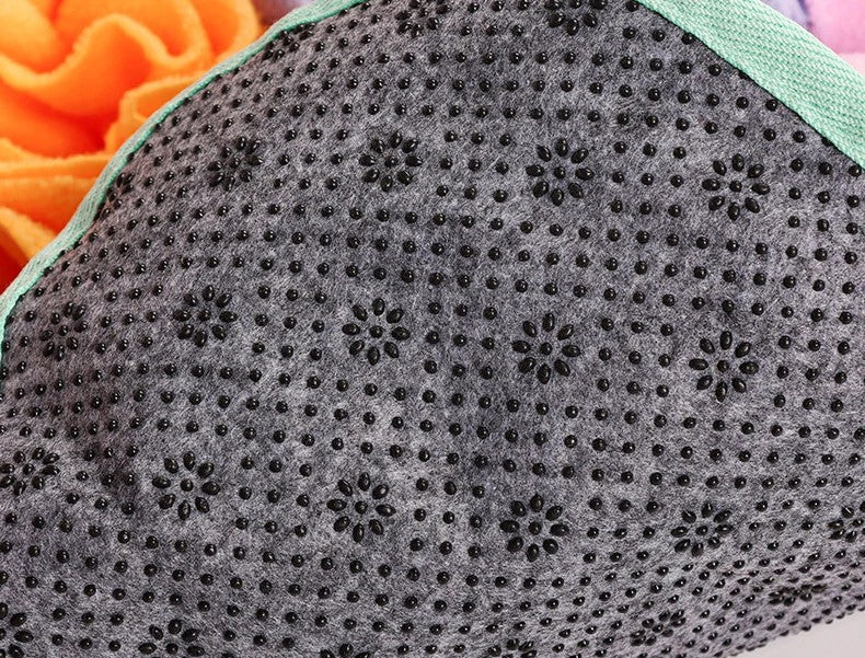 Underside of the jellyfish snuffle mat with a dotted grip backing