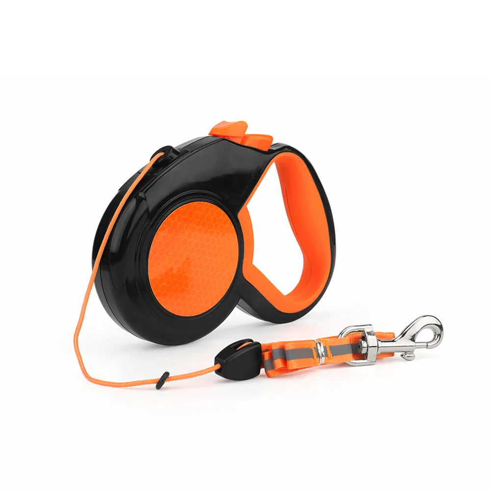 Retractable dog leash in orange with the cord extended