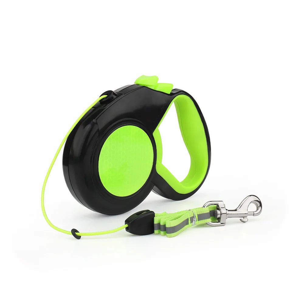 Retractable dog leash in green with the cord extended