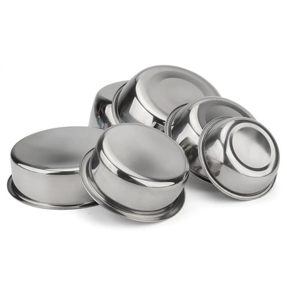 Stainless steel pet bowls stacked together for storage