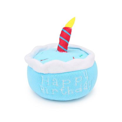 Blue round Happy Birthday cake dog toy with a striped candle