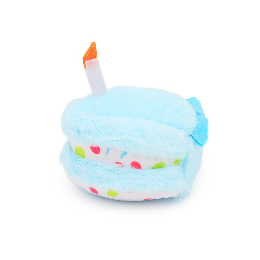 Blue cake slice dog toy with a candle