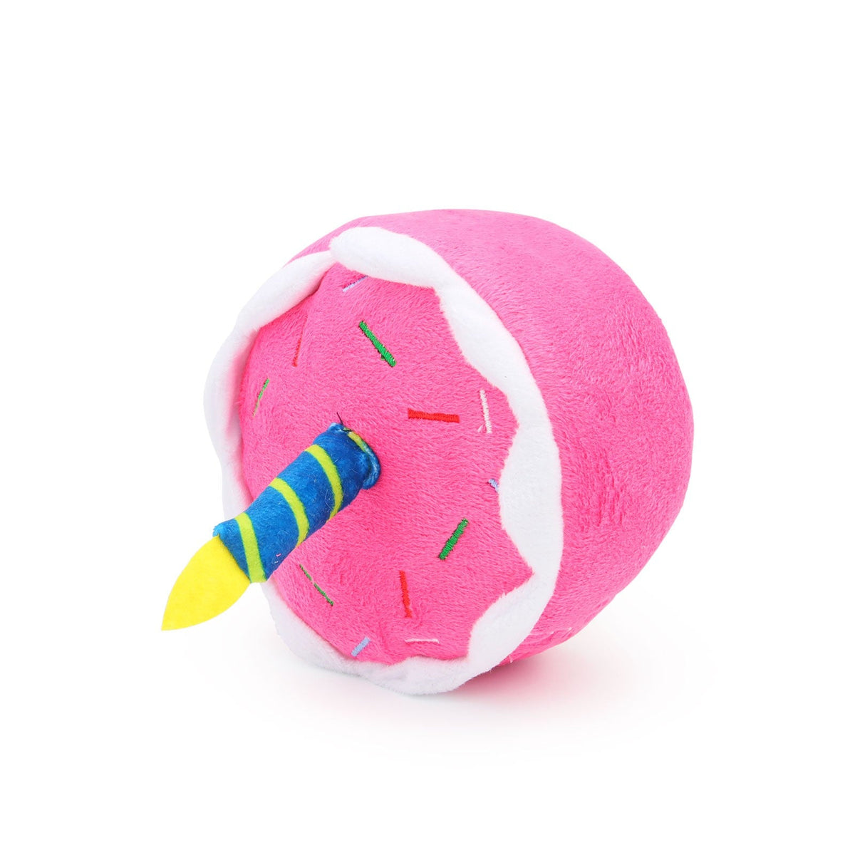 Top of the pink plush birthday cake with sprinkles
