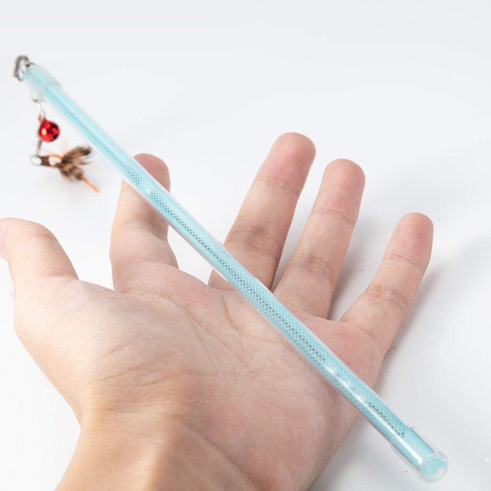 Bug cat toy wand held in a hand to show the 25 cm stick