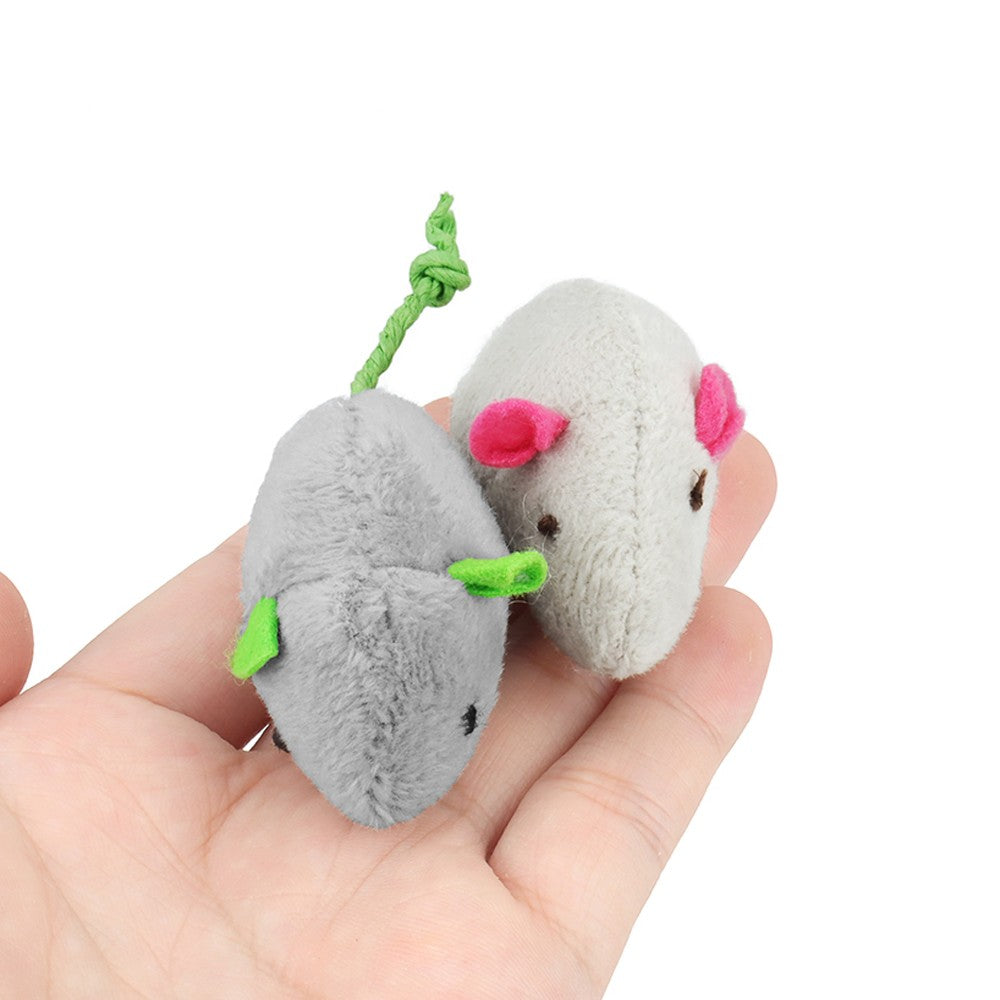 Two plush catnip mice in the palm of a hand