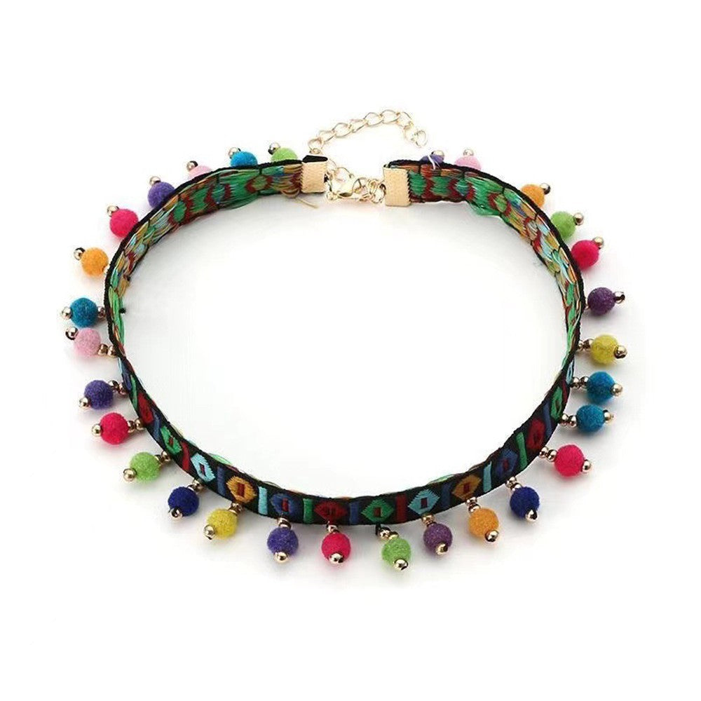 Boho cat necklace on a black woven band with rainbow beads