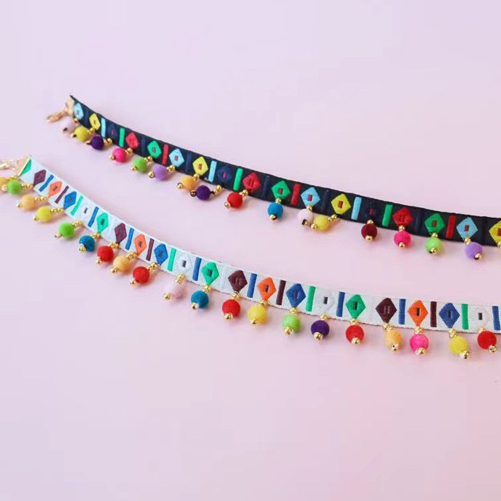 Black and white woven bands of the boho cat necklace