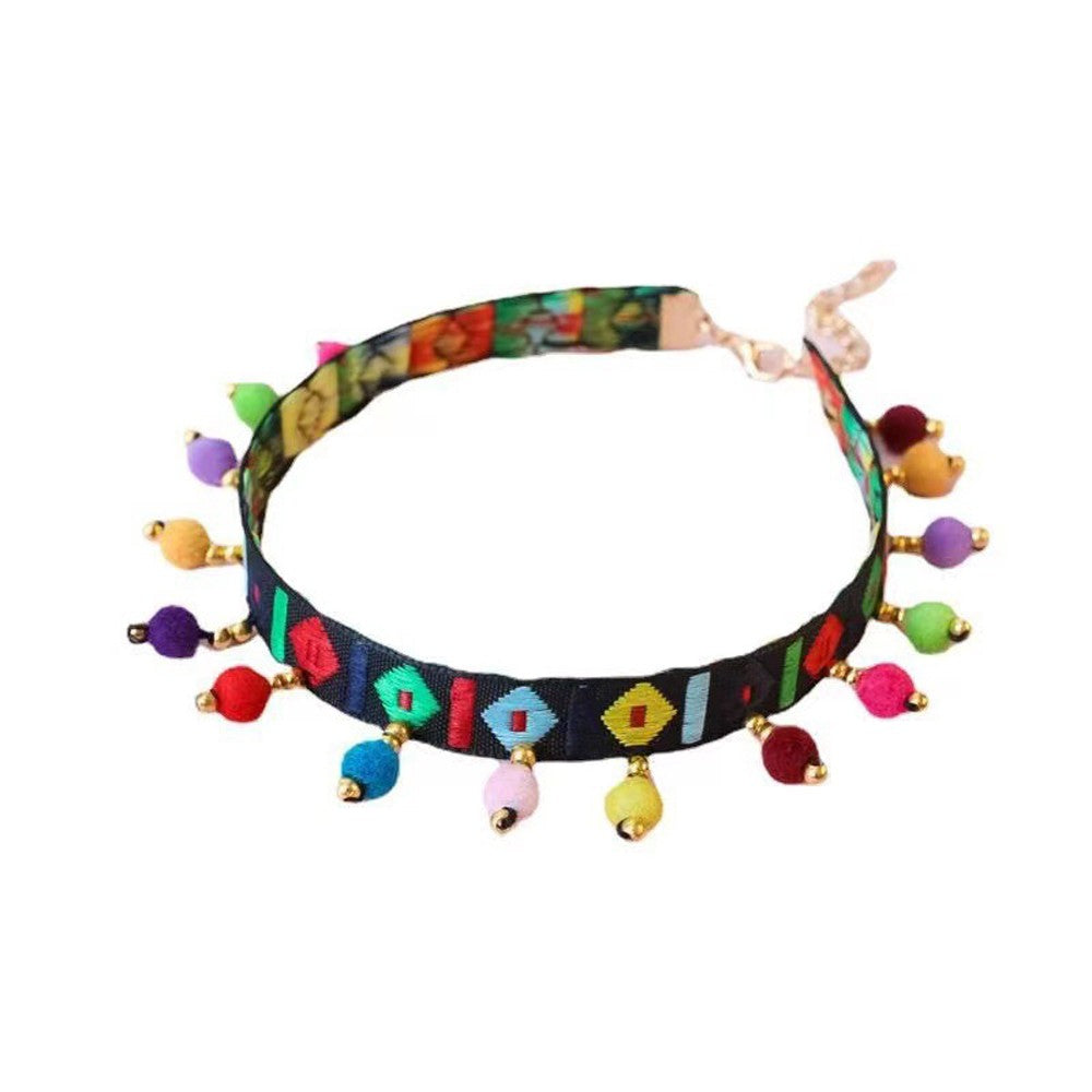 Black boho necklace collar laid flat