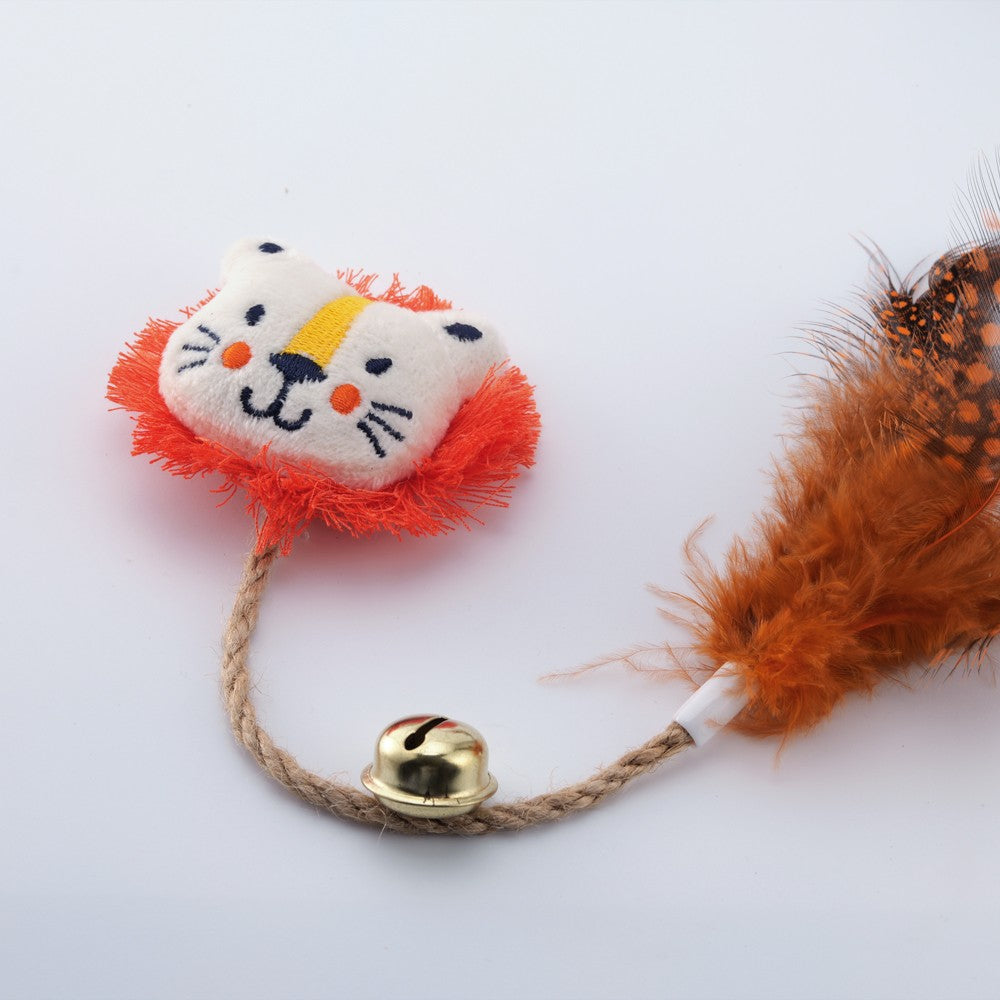 Lion face catnip toy with orange feathers and a bell