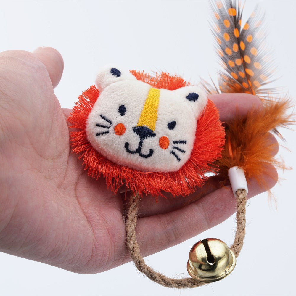 Lion face catnip toy with a feather tail, bell and rope loop