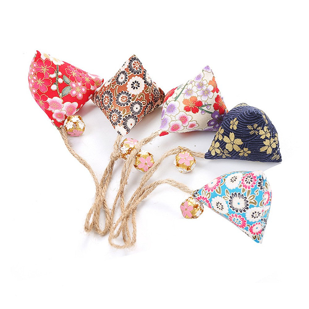 Three catnip sachets in assorted floral fabric prints