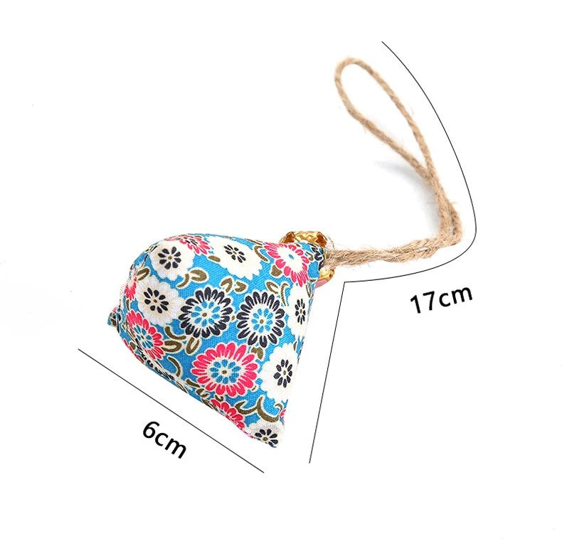 Blue floral catnip sachet with a rope loop for hanging