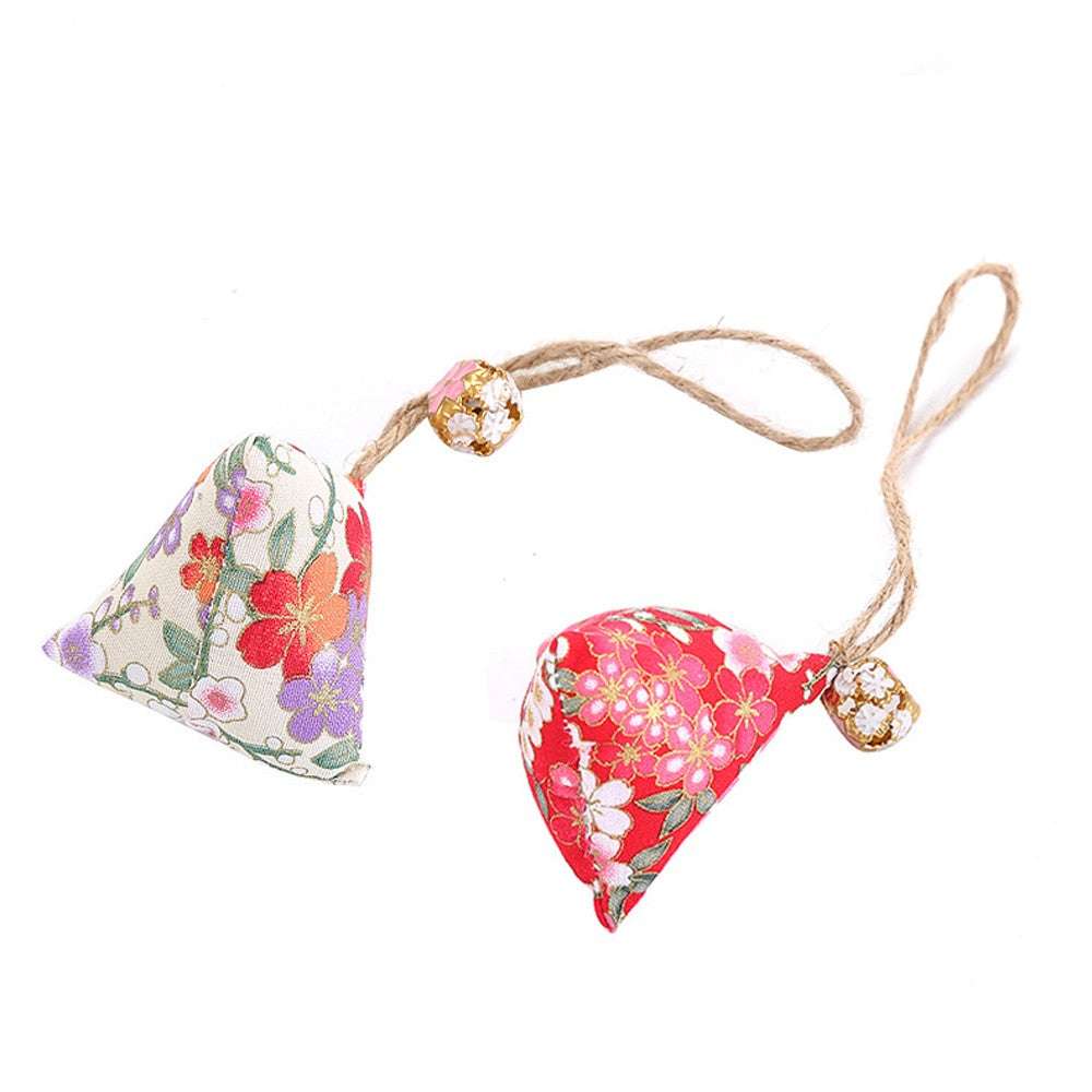 Two floral catnip sachets with small charms