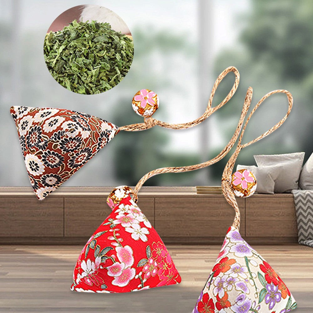 Catnip sachets hanging in a sunny room