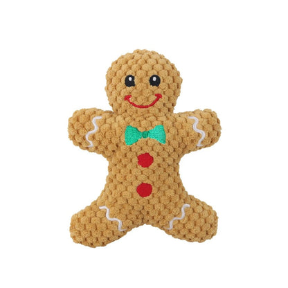 Gingerbread dog toy in tan with green bow tie, front view