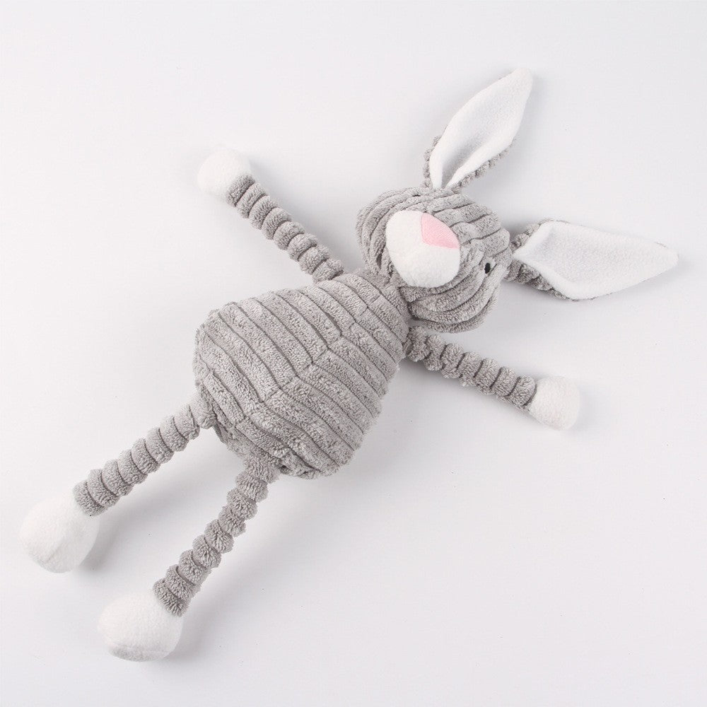 Gray rabbit dog toy lying flat with arms and legs out