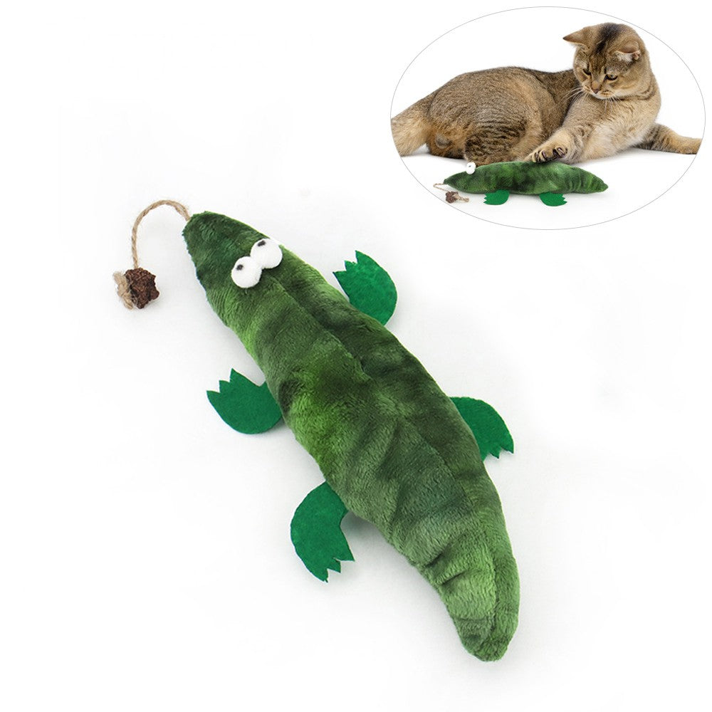 Green plush crocodile cat toy with a rope tail and a cat playing