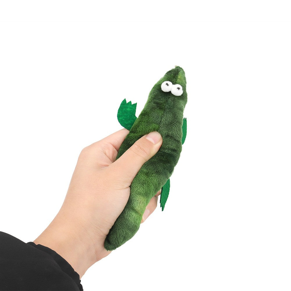 Hand holding the green crocodile cat toy to show its size