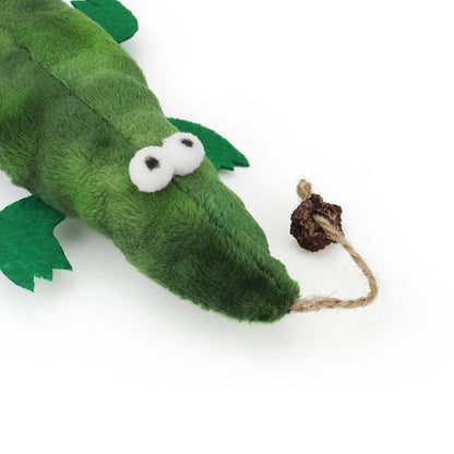 Close-up of the crocodile cat toy face and rope tail