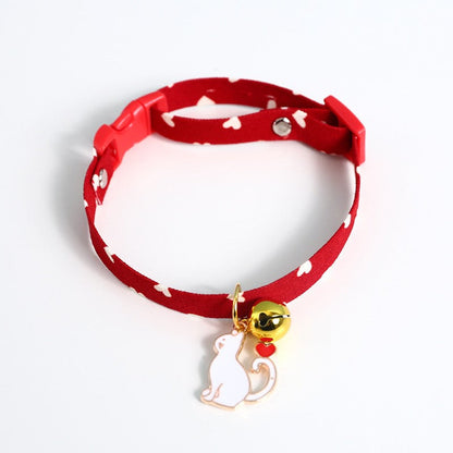 Red star print cat collar with bell and white cat charm
