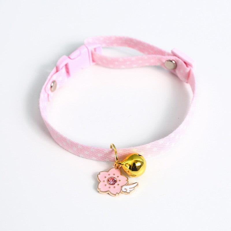 Pink star print cat collar with bell and flower charm