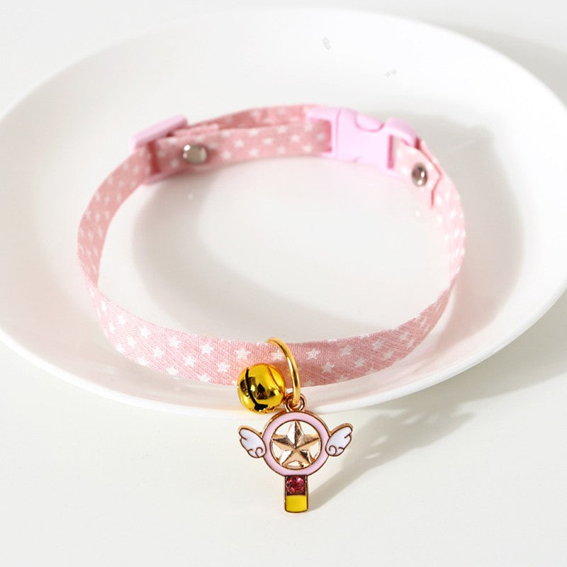 Pink star print cat collar with bell and magic wand charm