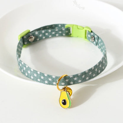 Green polka dot cat collar with bell and avocado charm