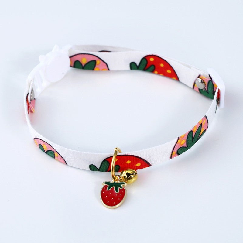 White fruit print cat collar with strawberry charm