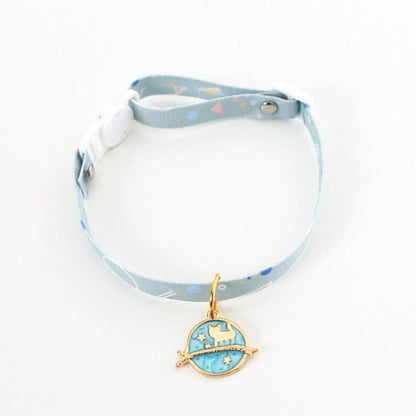 Light blue cat collar with a blue planet and cat charm