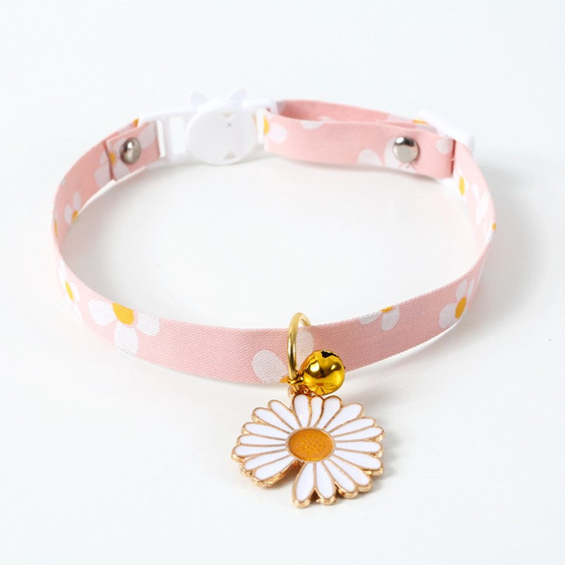 Pink polka dot cat collar with bell and daisy charm