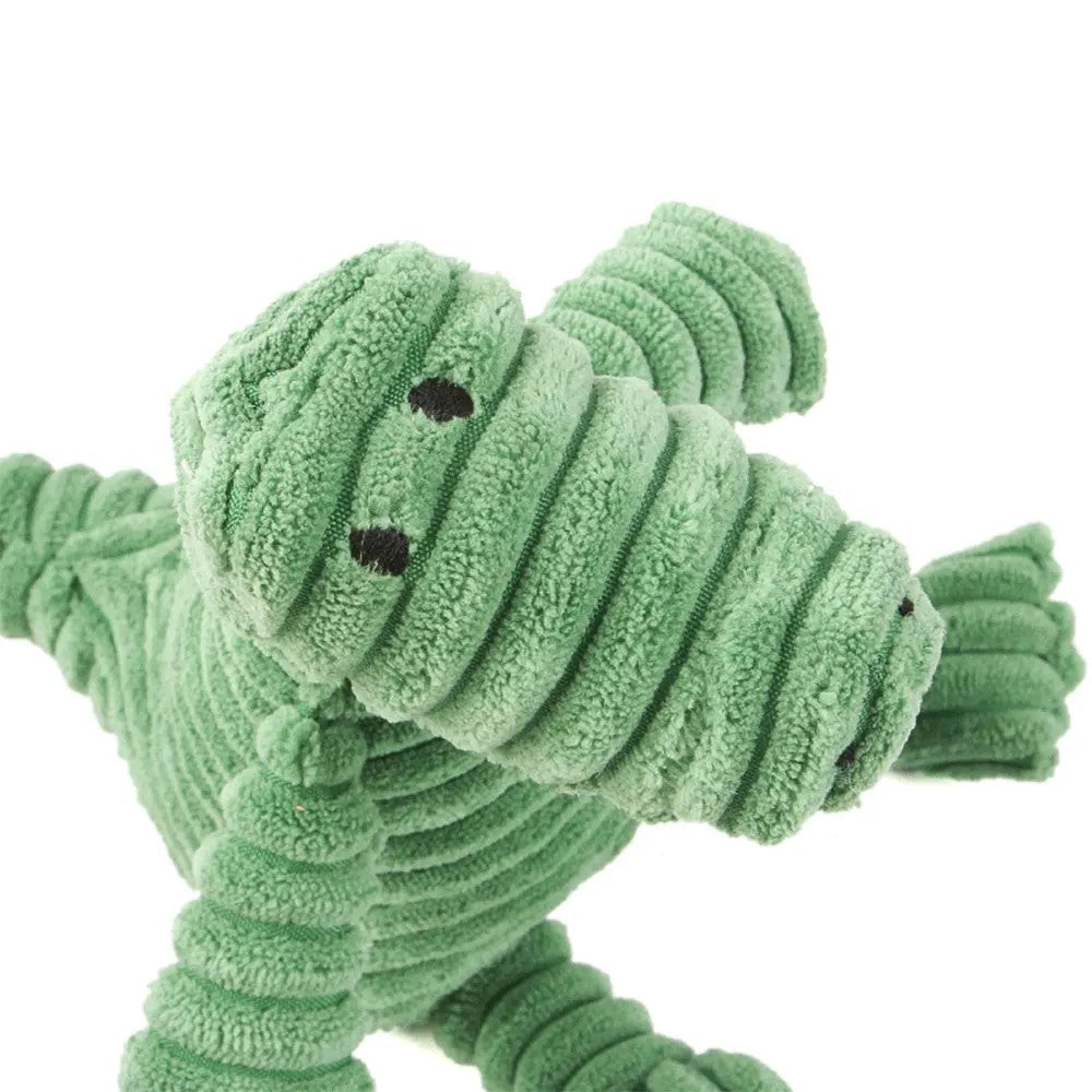 Close-up of the dinosaur toy face and corduroy texture