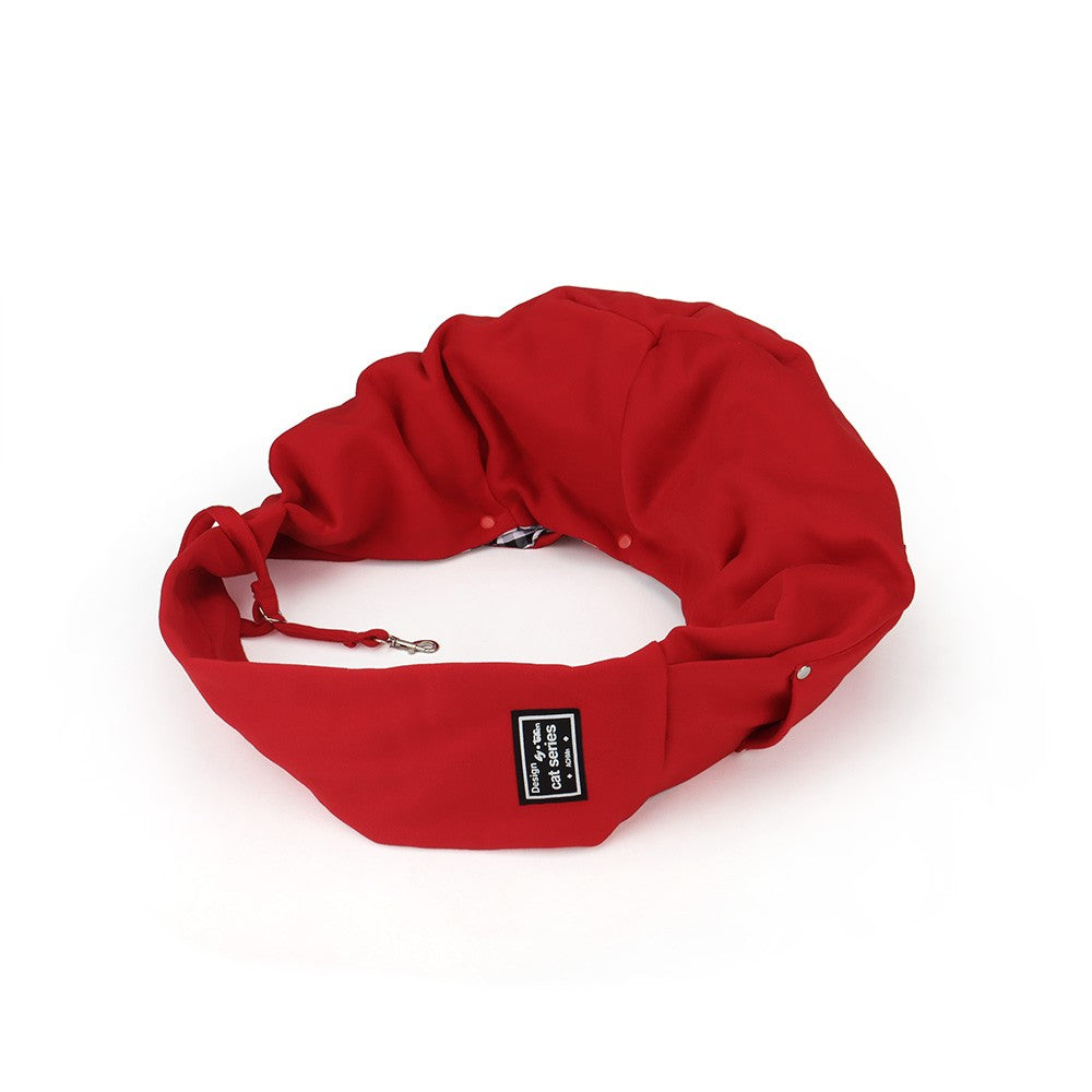 Red dog carrier bag laid flat to show the safety clip and pouch