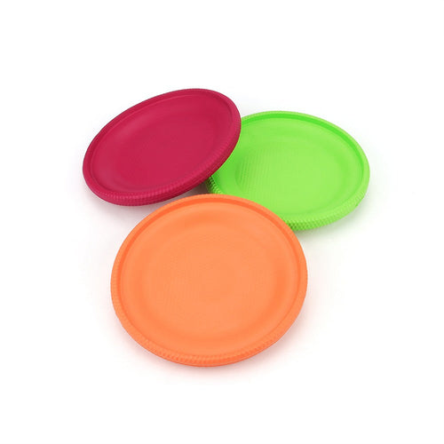 Three soft EVA foam dog frisbees in red, orange and green