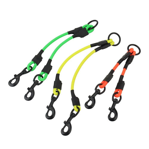 Dog leash couplers in neon orange, yellow and green