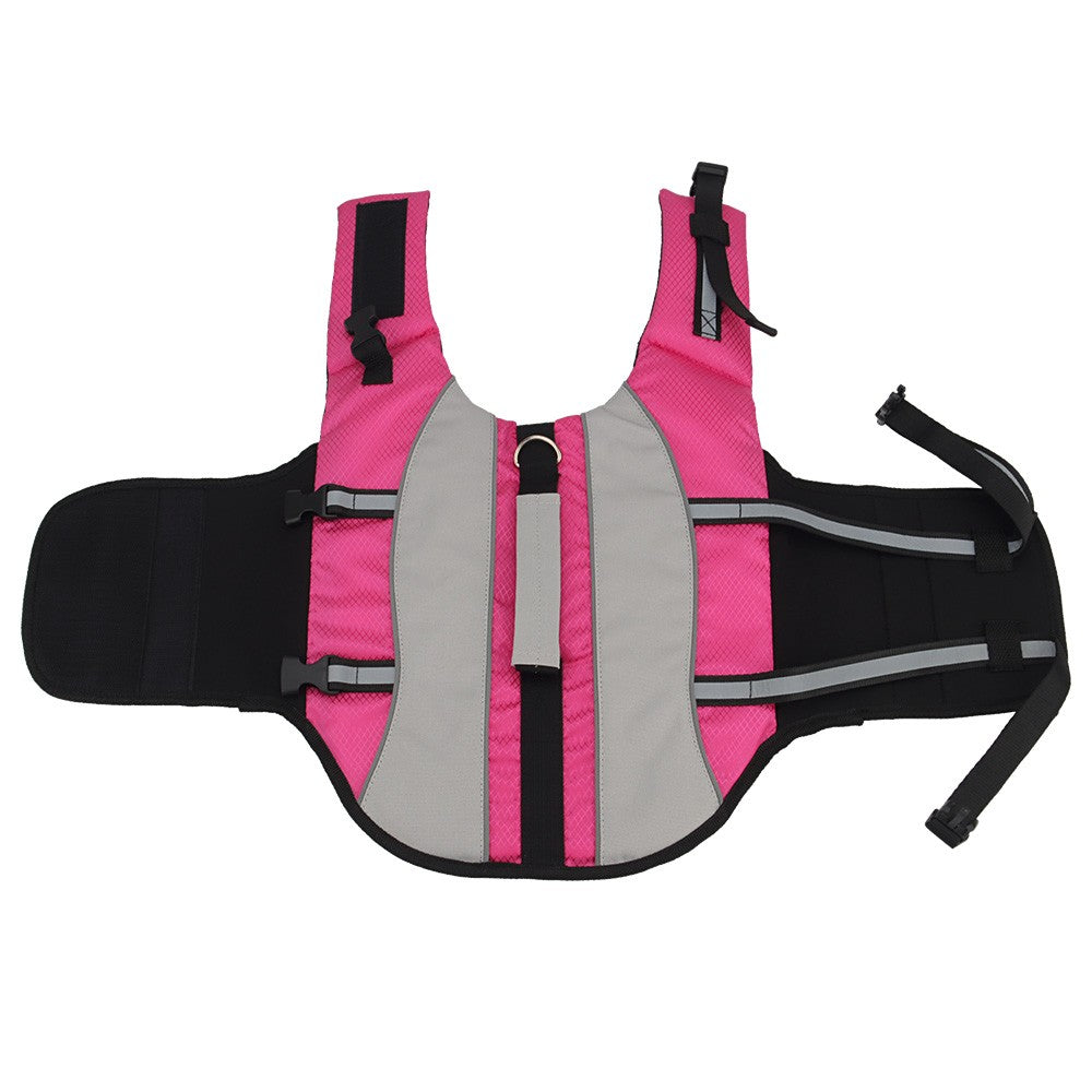 Pink dog life jacket with handle laid flat, showing the neck float