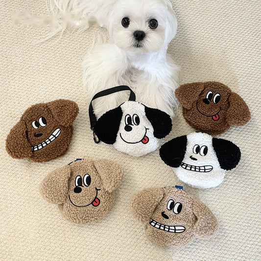 Plush dog poop bag holders in white, brown and tan with a small white dog