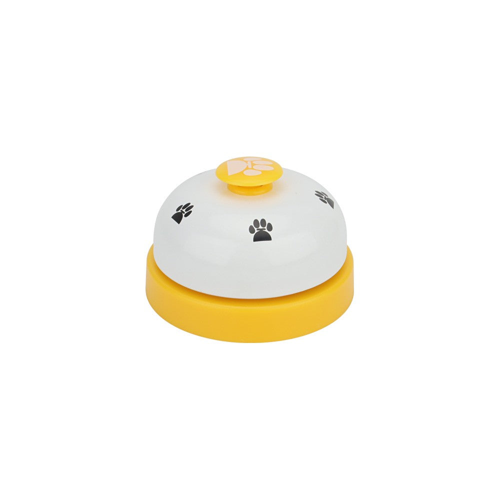 White and yellow dog potty training bell with paw print