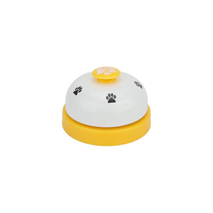 White and yellow dog potty training bell with paw print