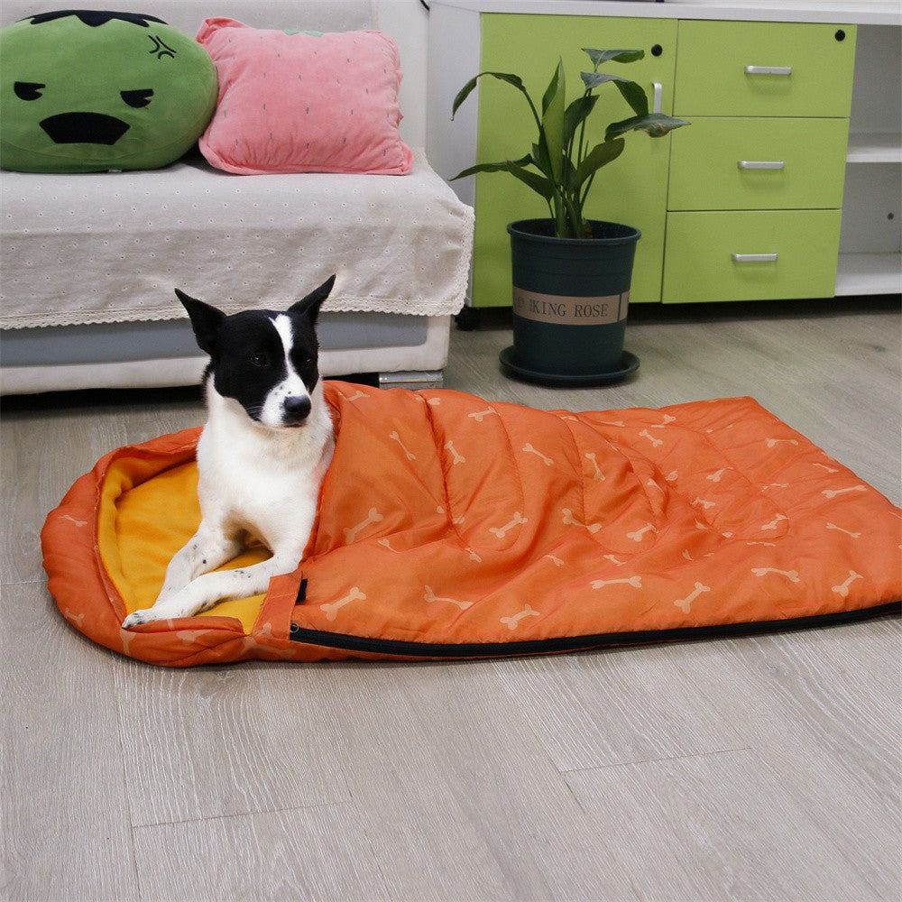 Dog lying on the dog sleeping bag at home