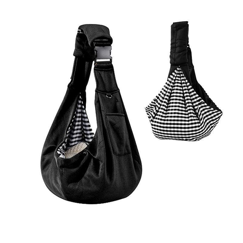 Black dog sling carrier with reversible houndstooth side