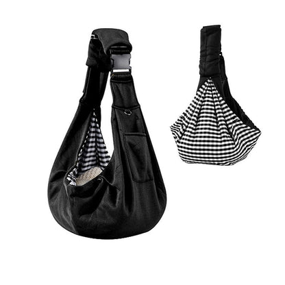Black dog sling carrier with reversible houndstooth side
