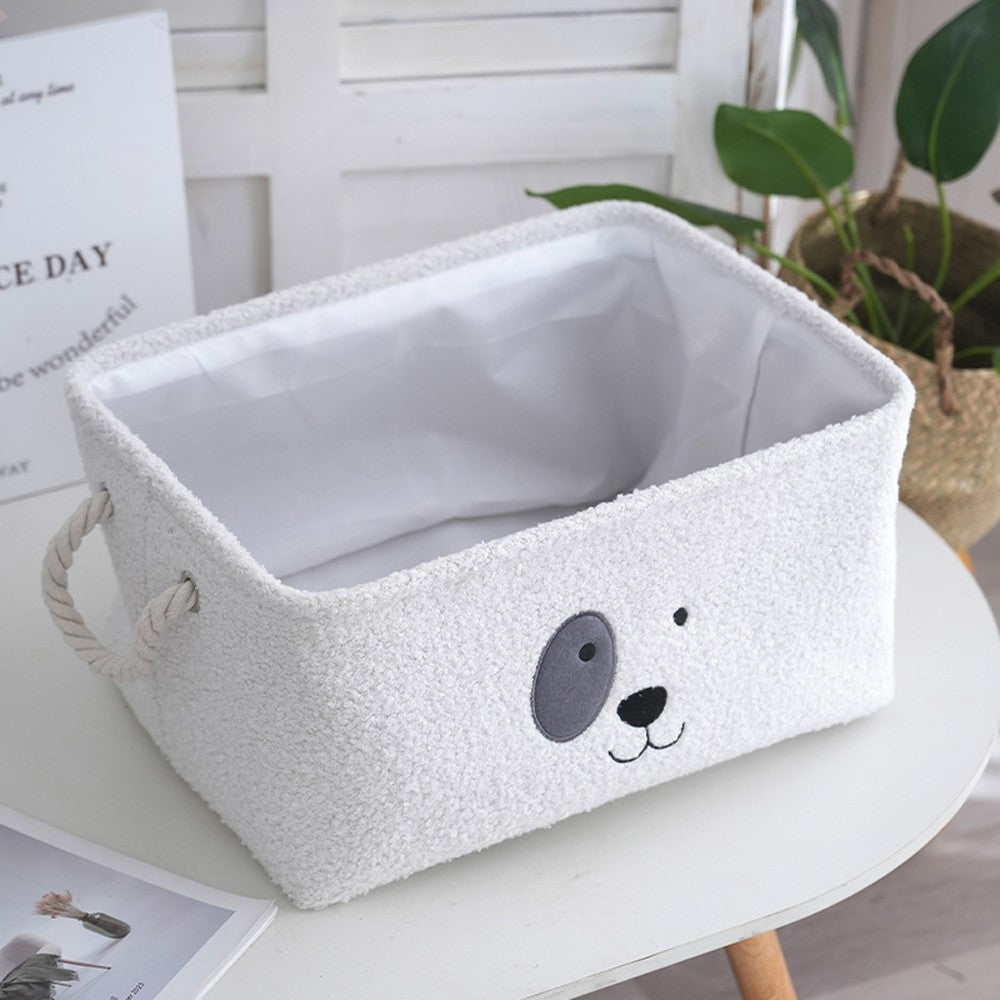 White plush dog toy box with a cartoon puppy face