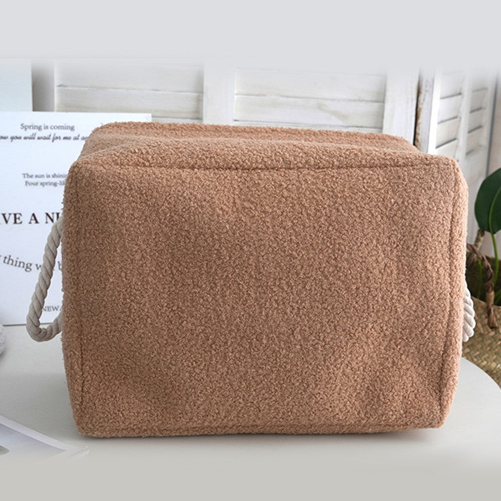Side view of the brown teddy plush dog toy bin