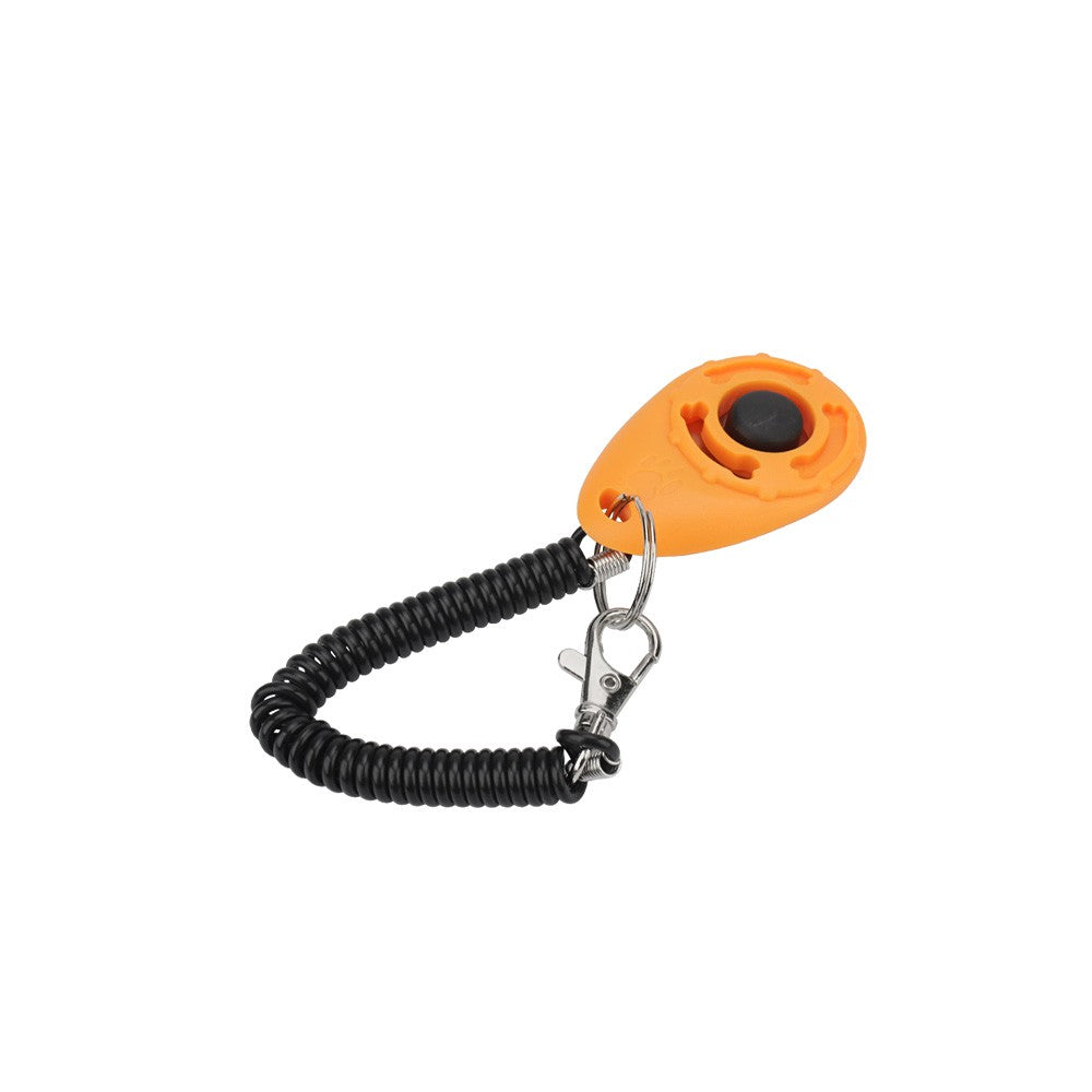Orange dog training clicker with coiled wrist strap