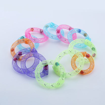 Mesh donut rings with small bells inside