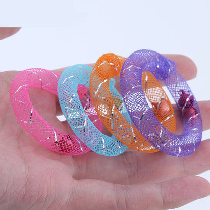 Stack of mesh ring toys held in a hand