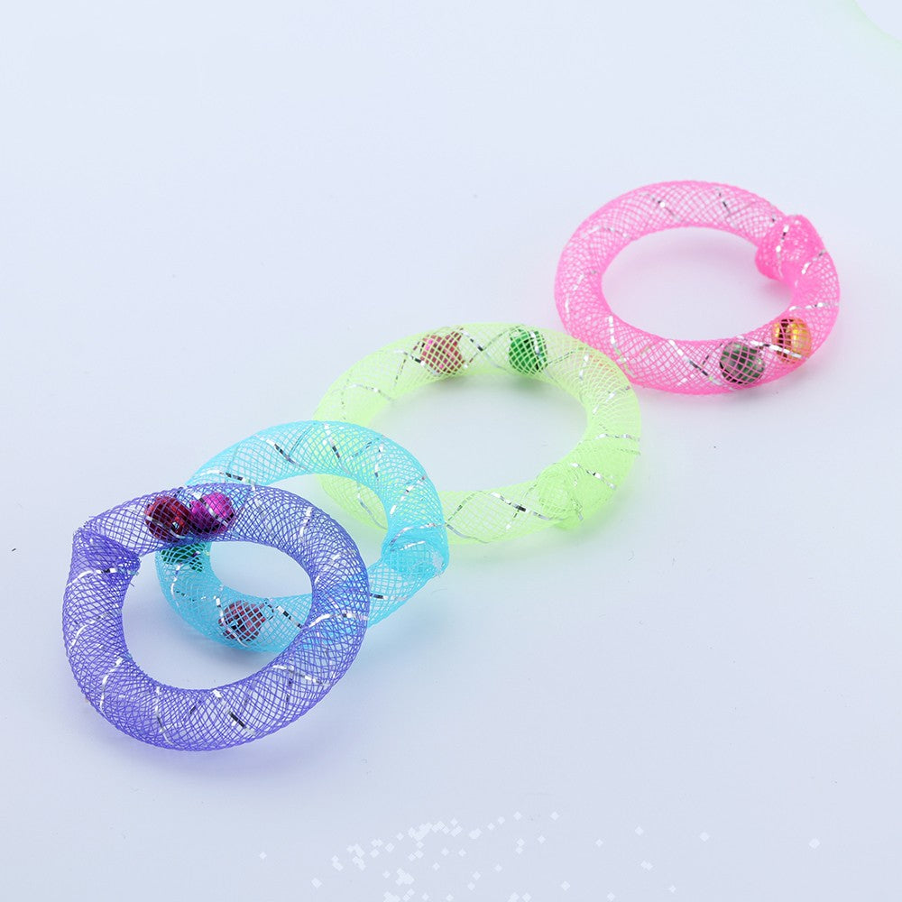 Close-up of three mesh rings with bells