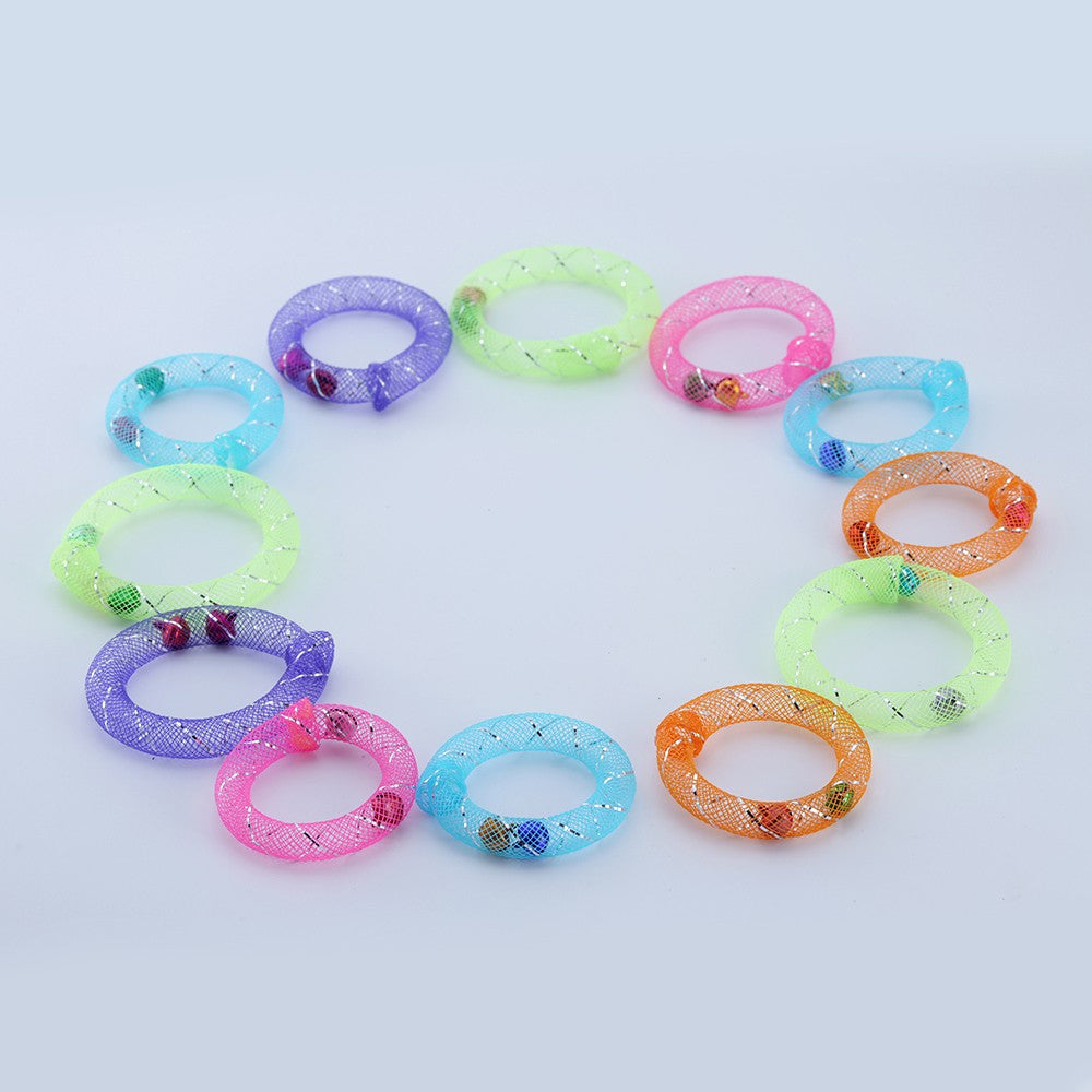 Mesh ring cat toys laid out in a circle