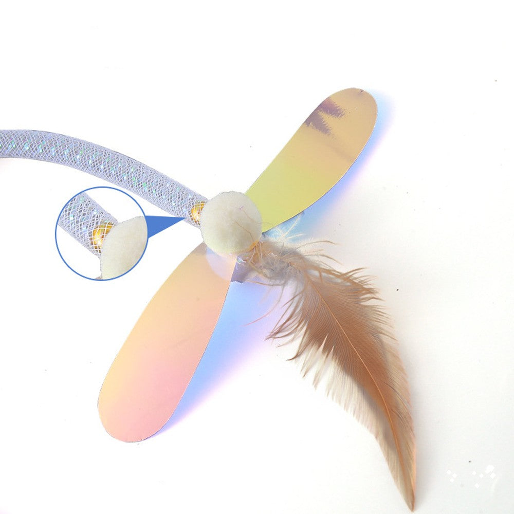 Close-up of the iridescent sequin wings and feather tip